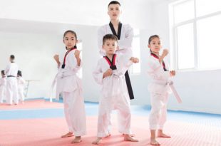 Group of Kids in Taekwondo Uniforms at Taekwondo Classes