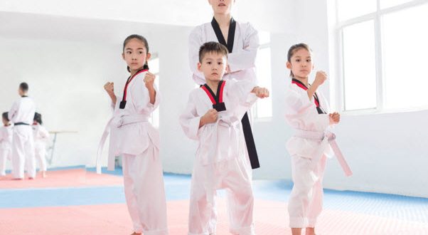 Group of Kids in Taekwondo Uniforms at Taekwondo Classes