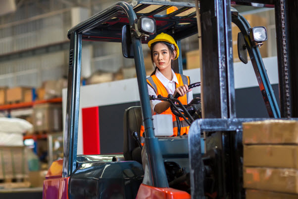 Woman in Hard hat Driving Forklift Singapore