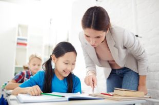 A Chinese tutor examining the student’s work
