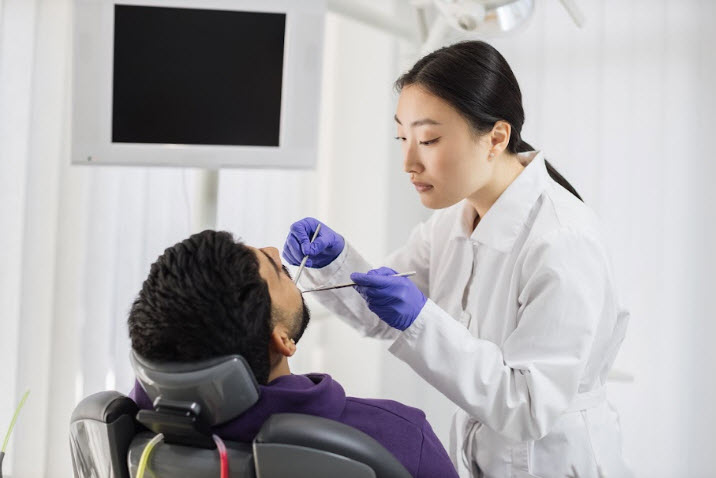 A patient going through dental examination