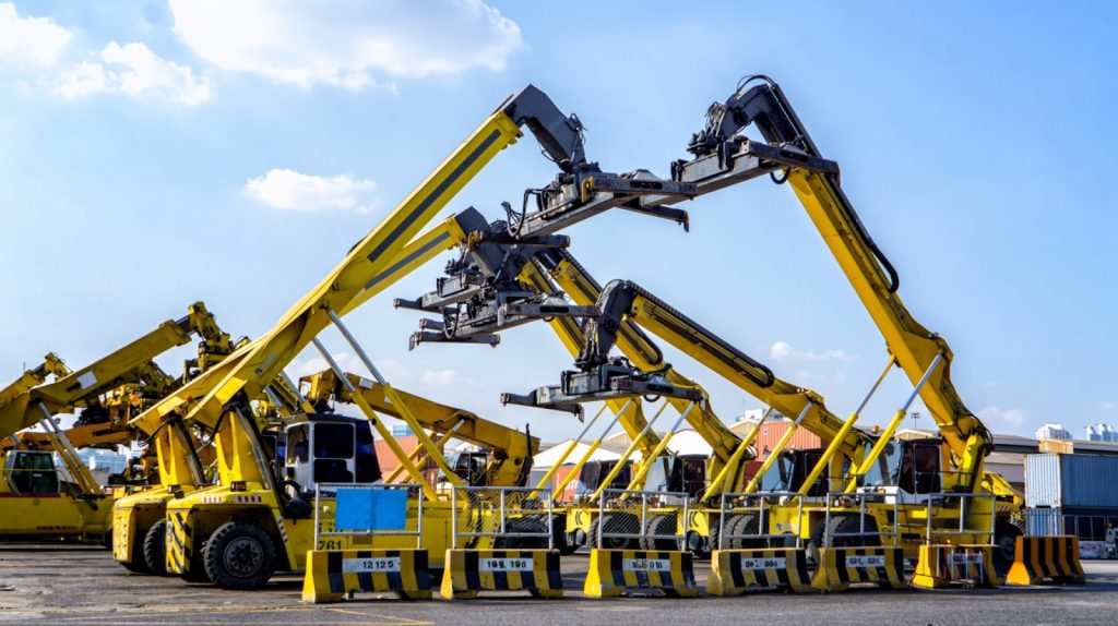 Cranes parked in a port facility