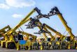 Cranes parked in a port facility