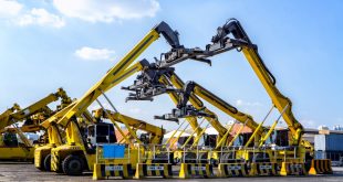 Cranes parked in a port facility