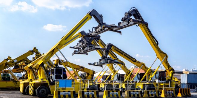 Cranes parked in a port facility