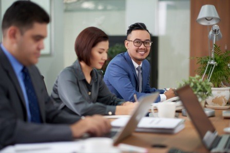A meeting discussing corporate governance strategies A meeting discussing corporate governance strategies
