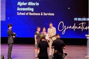 Our Director Terence Sim awarding the ITE Book Prize to a graduating student
