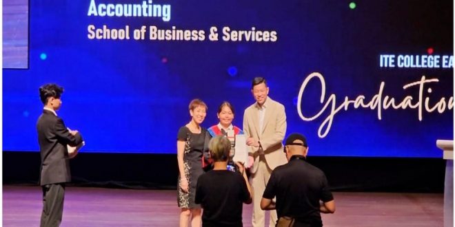 Our Director Terence Sim awarding the ITE Book Prize to a graduating student