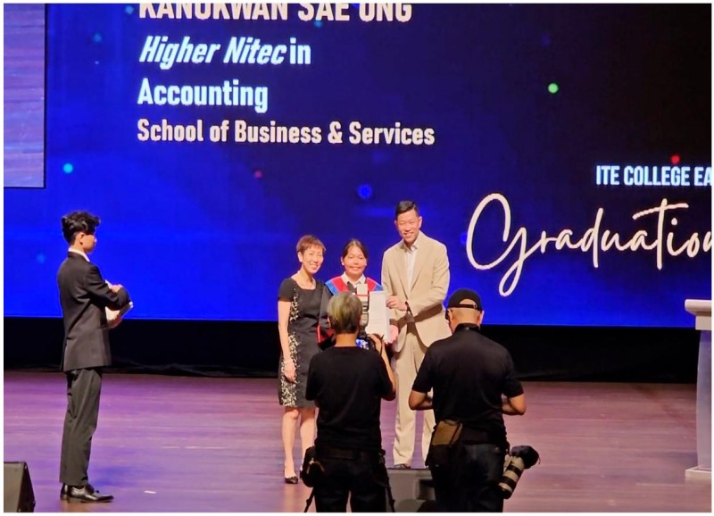 Our Director Terence Sim awarding the ITE Book Prize to a graduating student