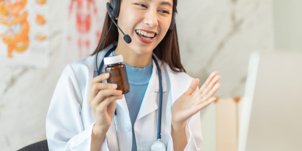 Female doctor conducting online teleconsultation in Singapore clinic