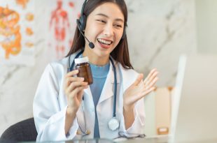 Female doctor conducting online teleconsultation in Singapore clinic