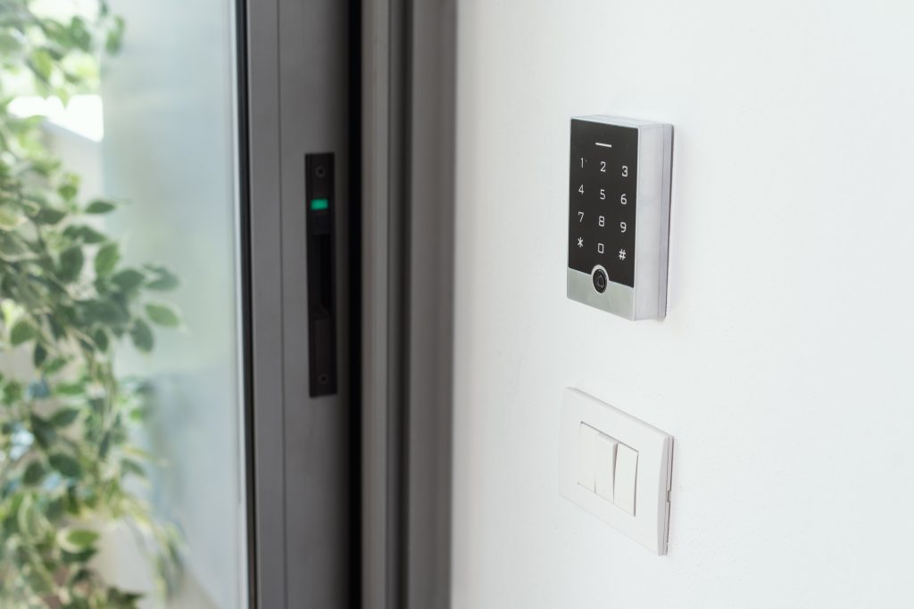 An access control keypad mounted on a wall.