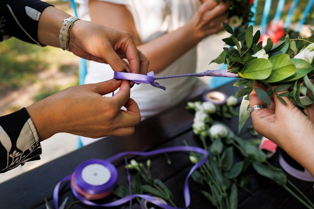 Wedding floral arrangements with printed ribbons