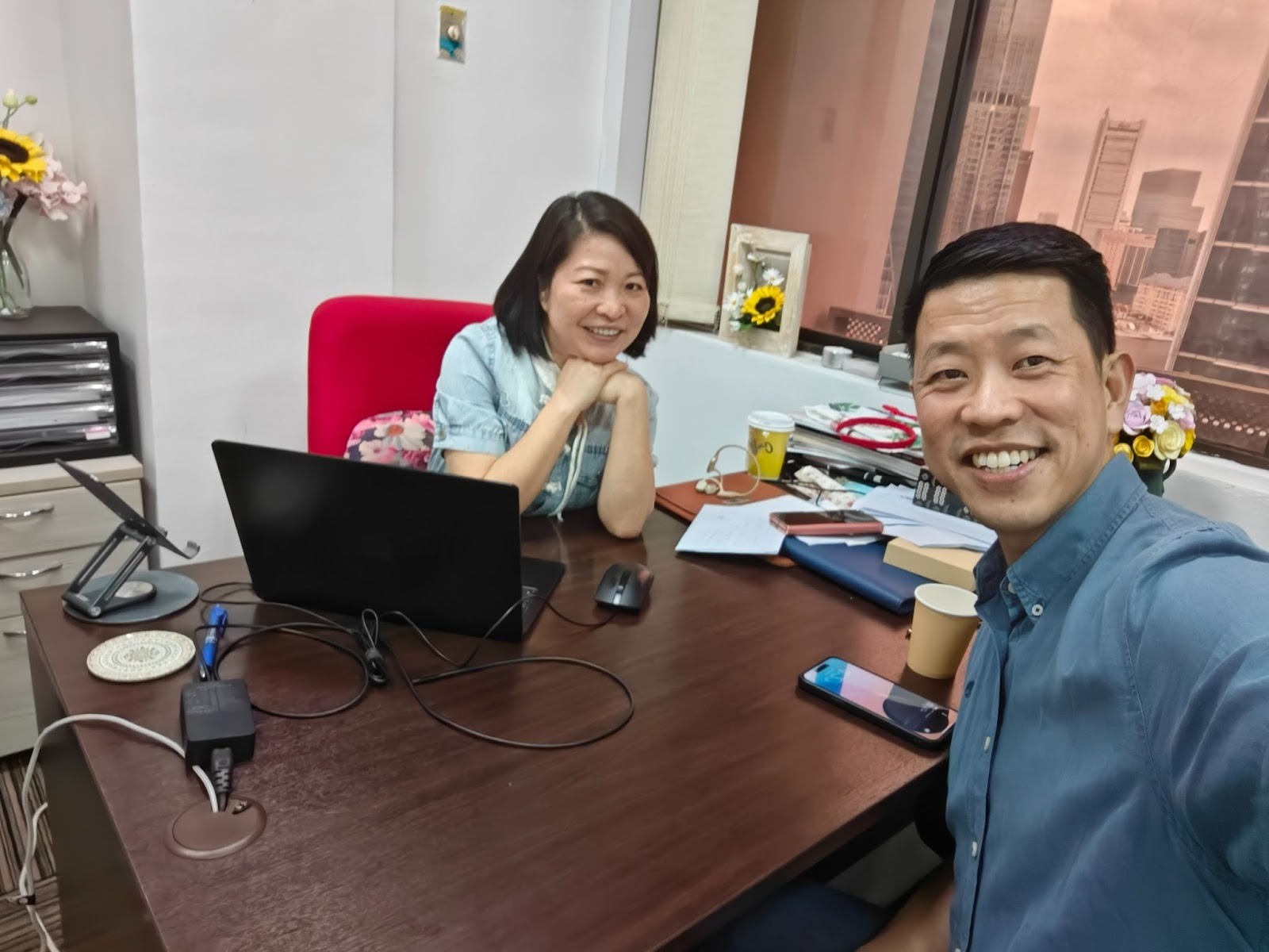 Director Mr Terence Sim with a client at Tanjong Pagar