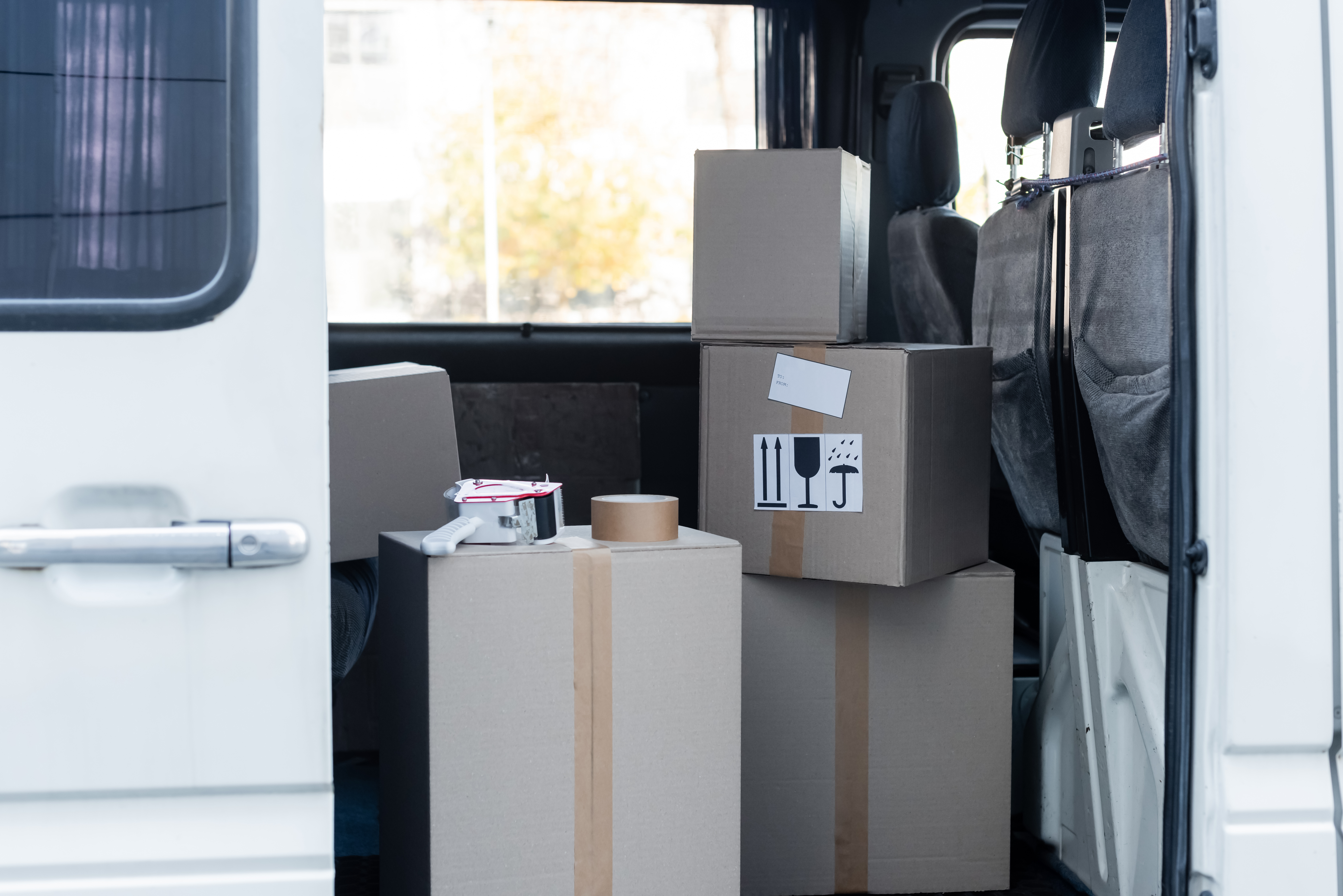 Home moving services Singapore transporting packed boxes safely during relocation

