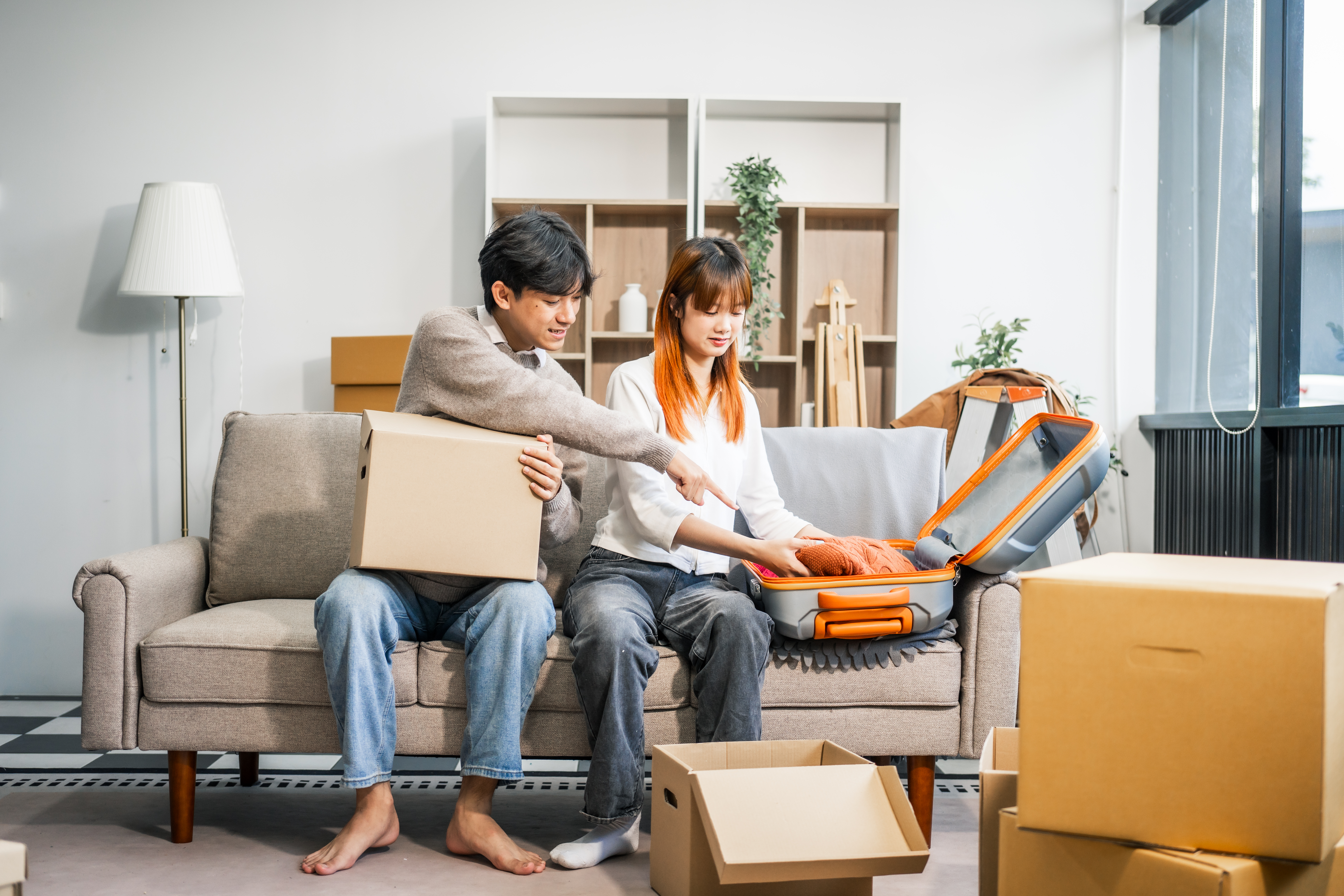 Residential moving services team packing household items in Singapore
