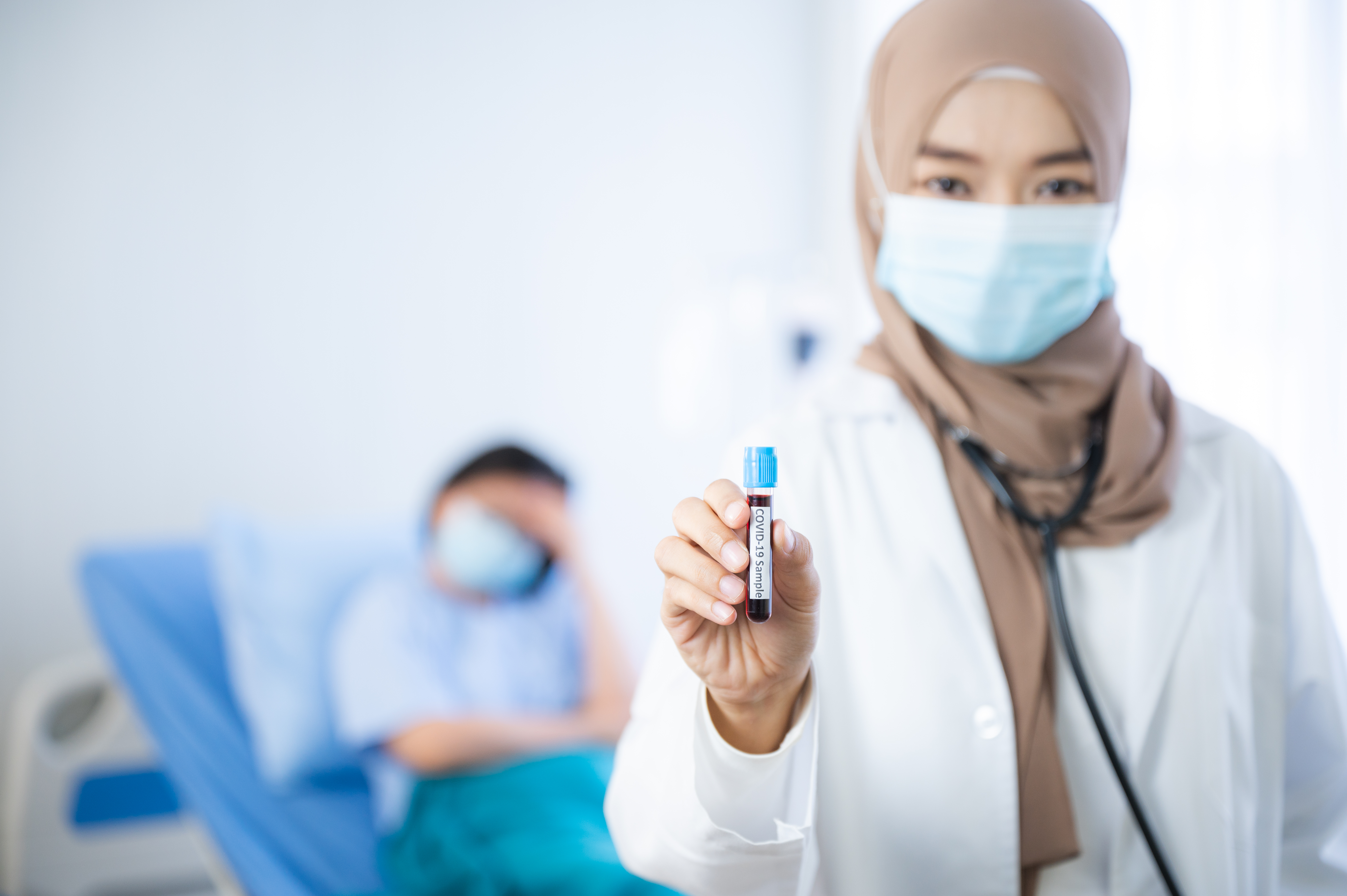 Doctor providing umrah vaccination consultation in Singapore