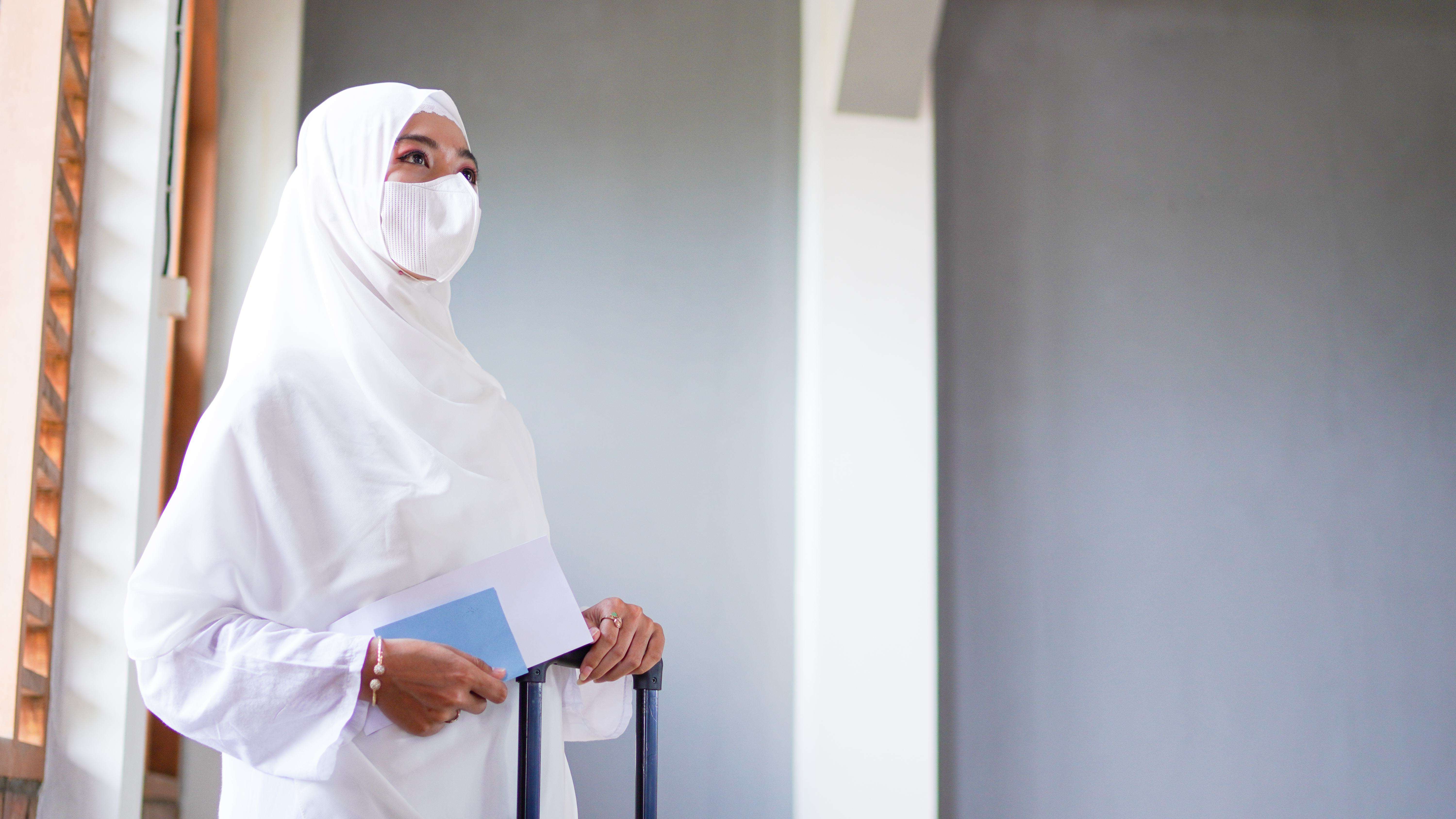 Pilgrim preparing for travel after umrah vaccine in Singapore