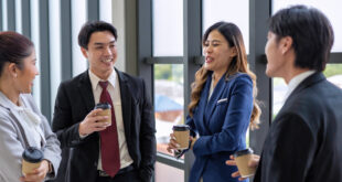 Business professionals attending a networking event at a centrally located corporate venue