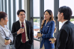 Business professionals attending a networking event at a centrally located corporate venue