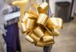 Gold metallic ribbon with customised ribbon for corporate gifts