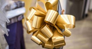 Gold metallic ribbon with customised ribbon for corporate gifts