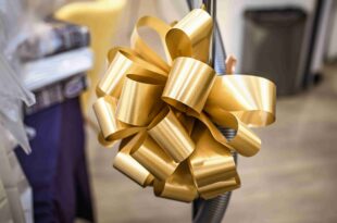 Gold metallic ribbon with customised ribbon for corporate gifts