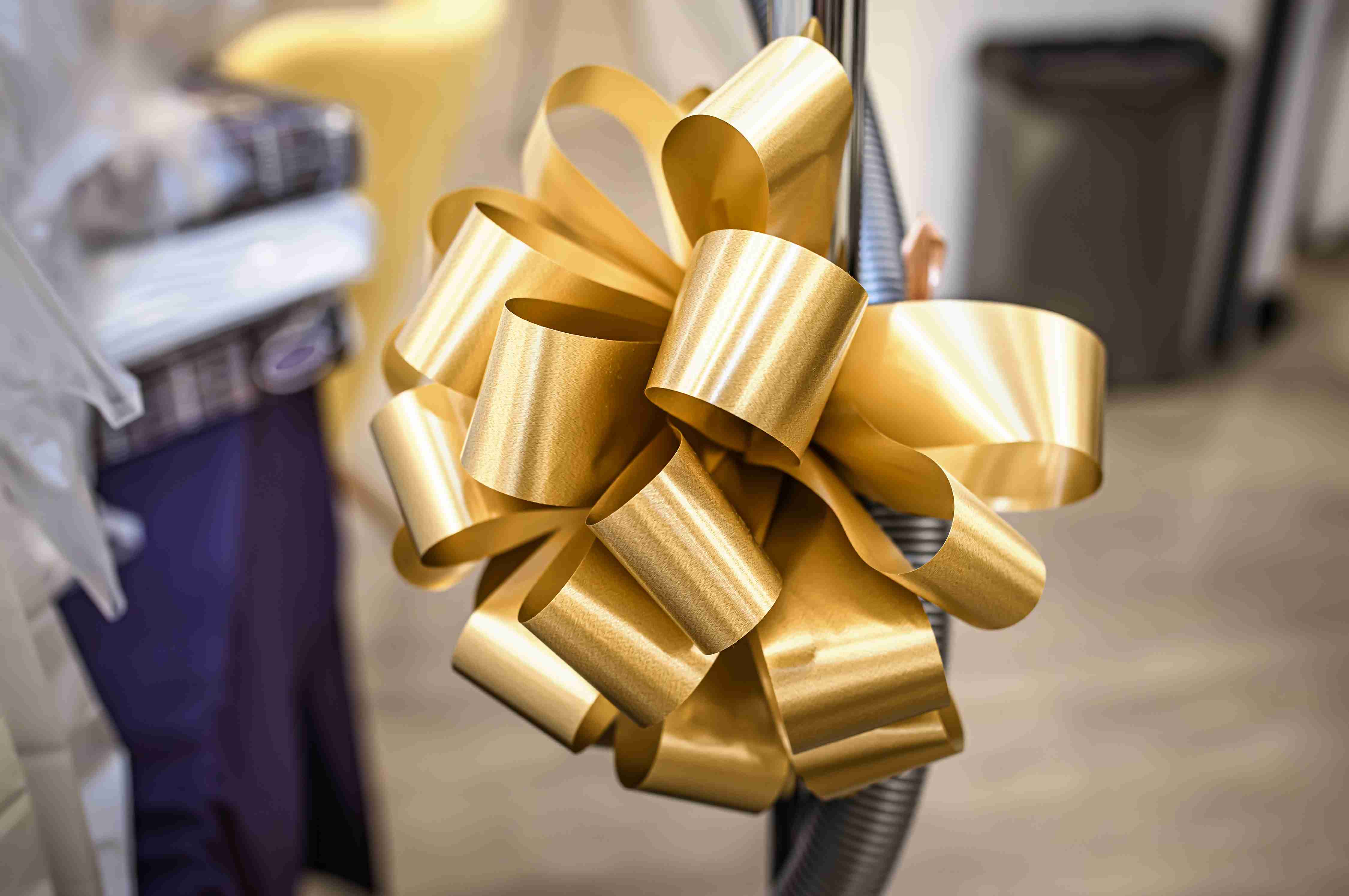 Gold metallic ribbon with customised ribbon for corporate gifts