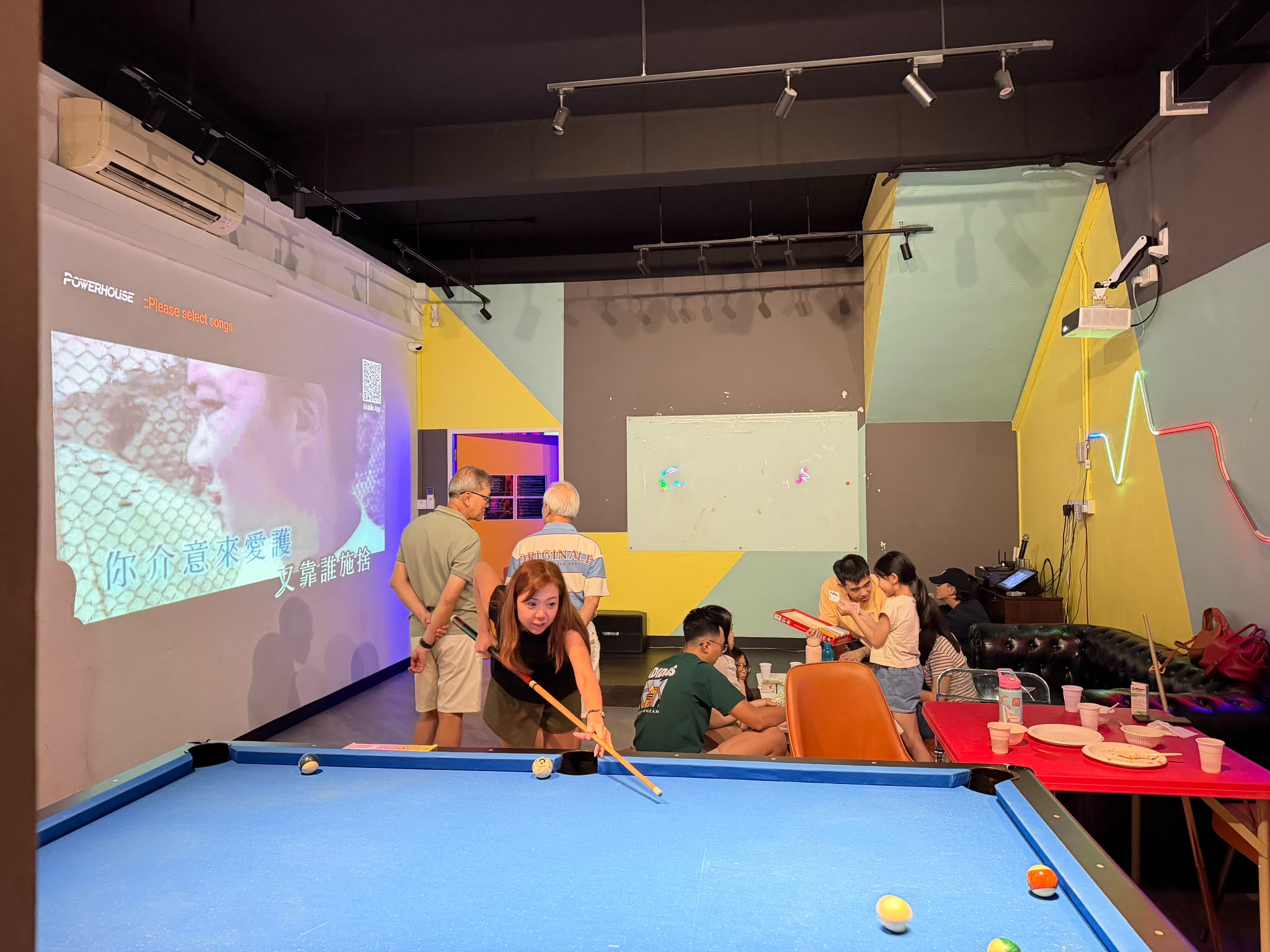 Comfortable corporate event space with seating and breakout areas